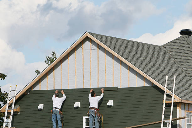Professional Siding technician working in Henrico, VA